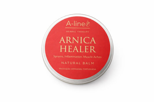A-line Arnica Healer natural herbal balm in a 60 ml container on a white background.